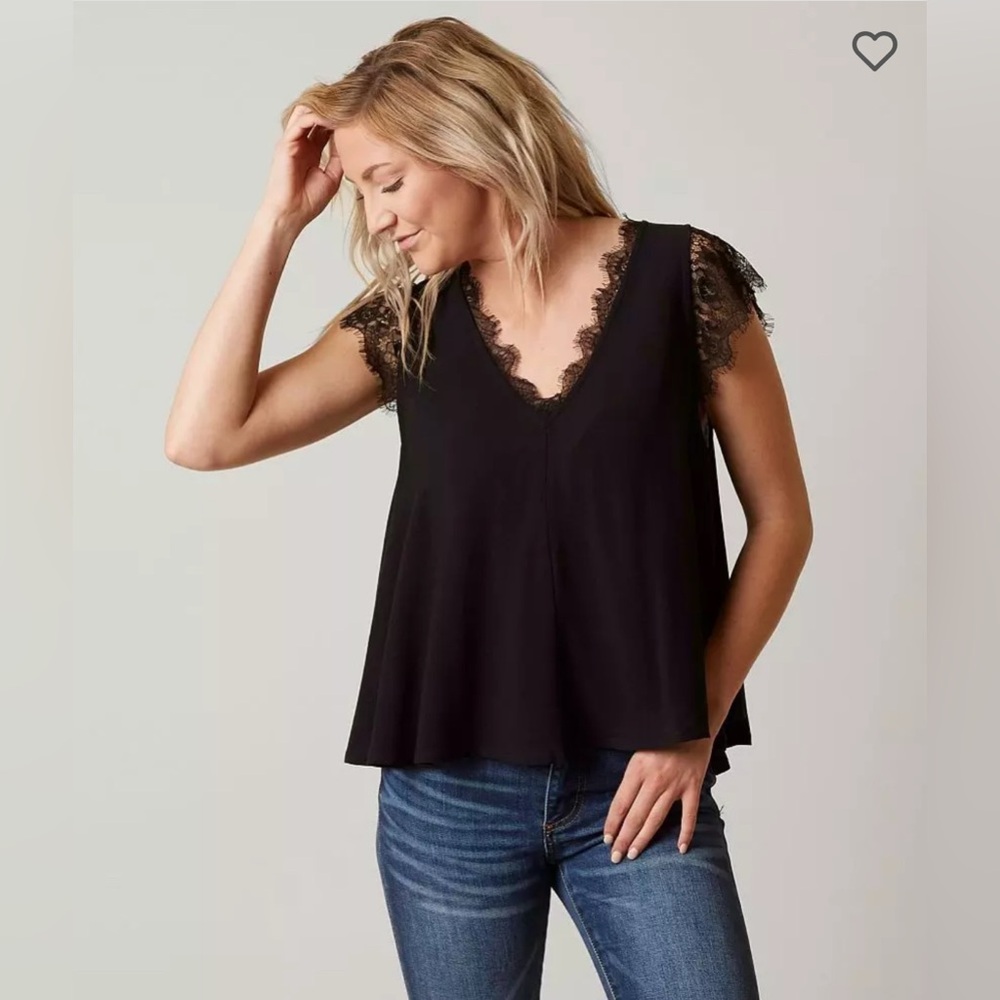 Free people v-neck black blouse with eyelash lace trim size M